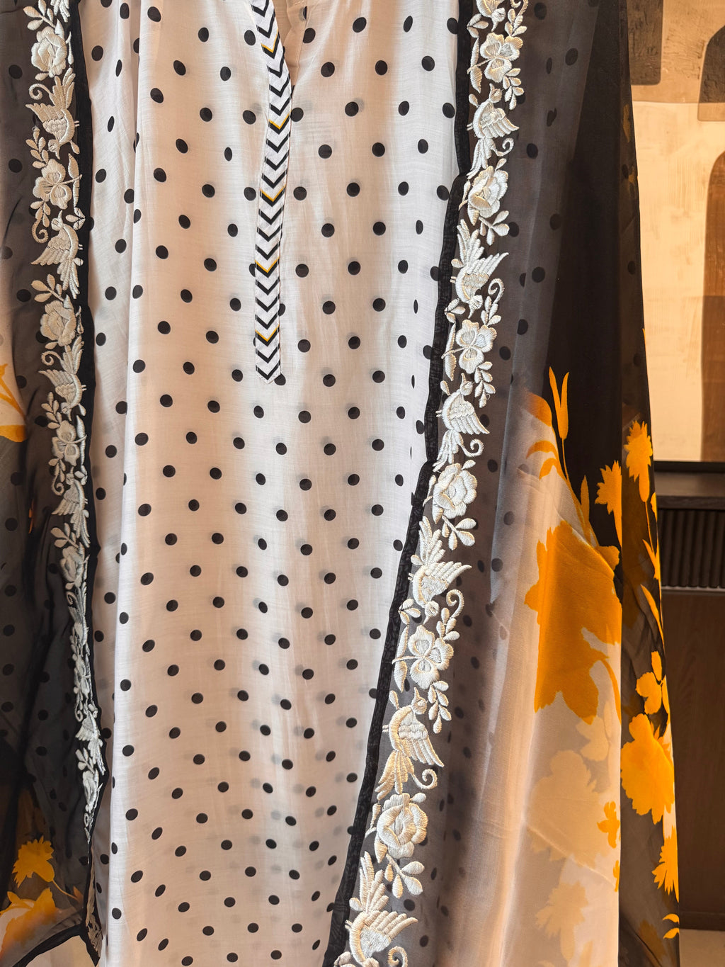 The Ishq Bloom — Polka Dot Muslin Suit with Cutwork Hem-ivory-close up