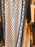 The Ishq Bloom — Polka Dot Muslin Suit with Cutwork Hem-ivory-close up