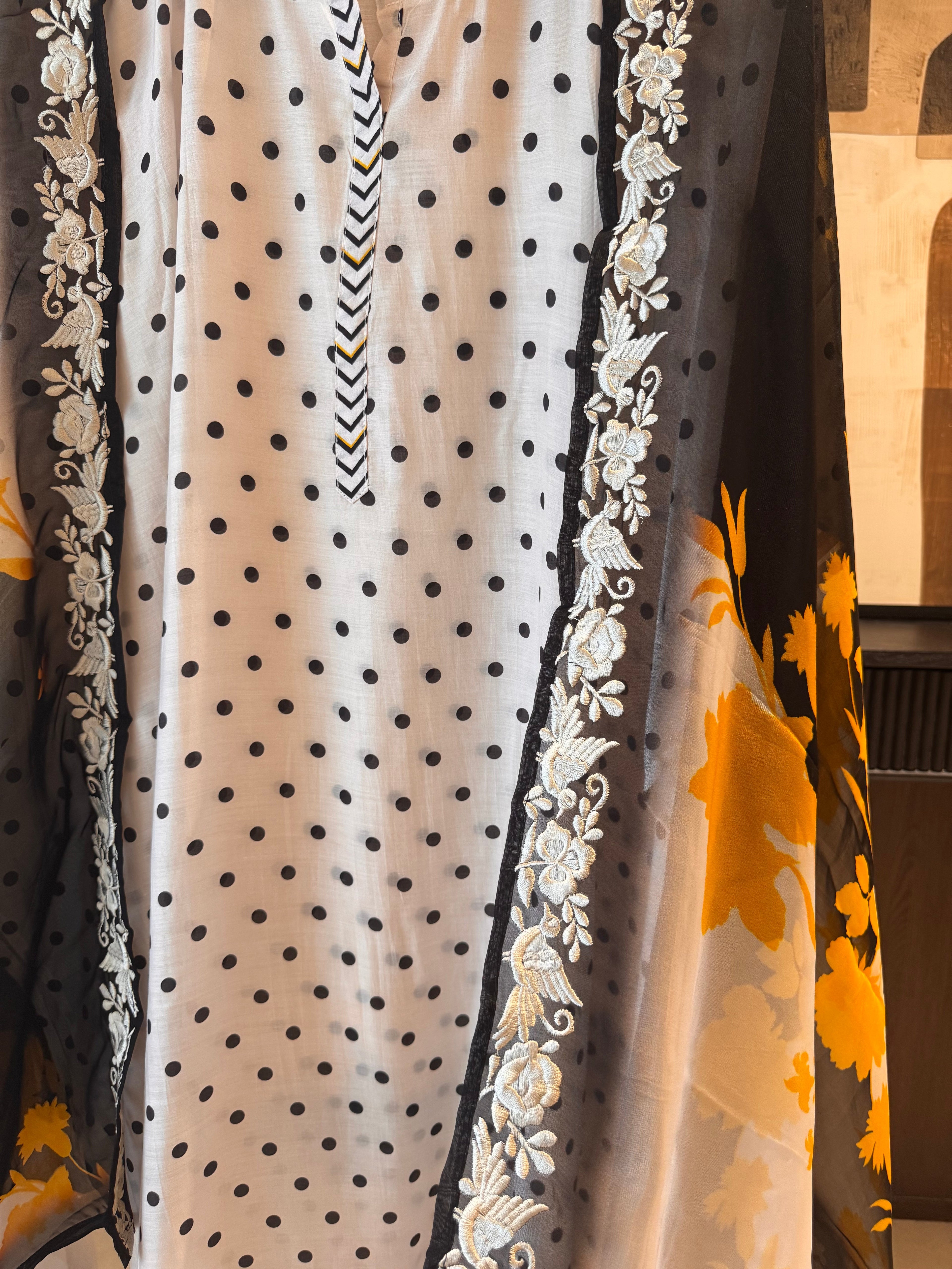 The Ishq Bloom — Polka Dot Muslin Suit with Cutwork Hem-ivory-close up